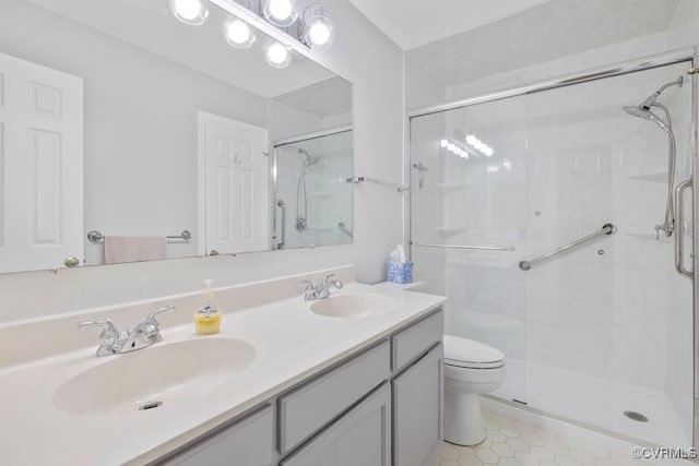 11693 Timberly Waye, Richmond, VA 23238 - bathroom featuring a shower stall, tile patterned flooring, toilet, and double vanity