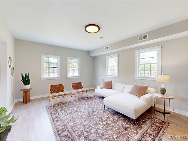 56 Mancha Ave, Claremont, VA 23899 - living room featuring light wood-style floors and baseboards