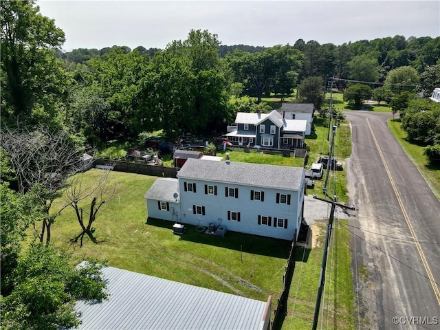 56 Mancha Ave, Claremont, VA 23899 - aerial view of property and surrounding area featuring a forest