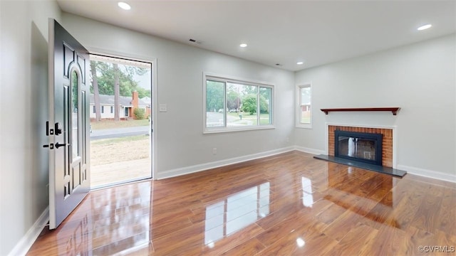 8803 Dena Dr, Henrico, VA 23229 - unfurnished living room with wood finished floors, recessed lighting, baseboards, and a fireplace