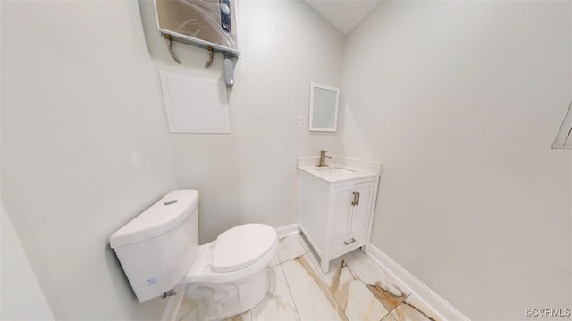 8803 Dena Dr, Henrico, VA 23229 - half bath with toilet, vanity, and baseboards