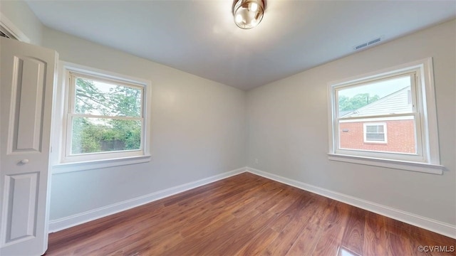 8803 Dena Dr, Henrico, VA 23229 - spare room featuring wood finished floors and baseboards