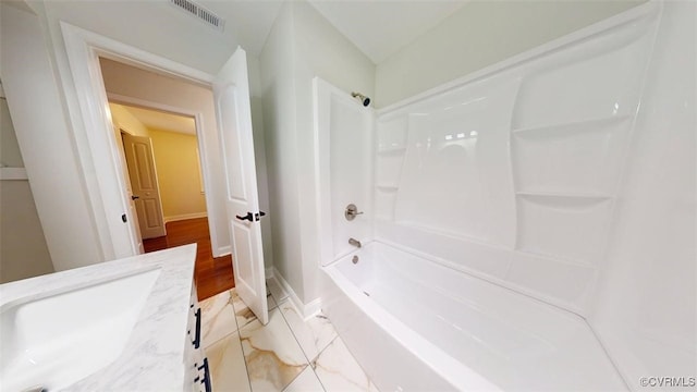 8803 Dena Dr, Henrico, VA 23229 - full bath featuring a sink, baseboards, and shower / bathtub combination