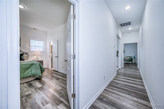 208 E 18th St, Richmond, VA 23224 - corridor with wood finished floors, baseboards, and recessed lighting