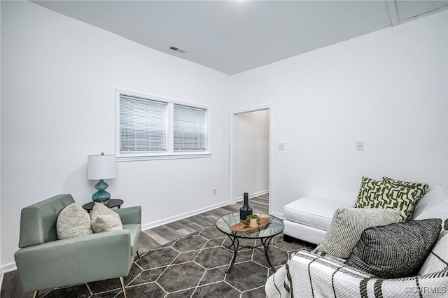 208 E 18th St, Richmond, VA 23224 - living area featuring wood finished floors and baseboards