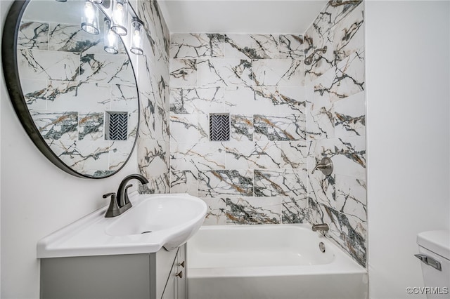 208 E 18th St, Richmond, VA 23224 - bathroom featuring vanity, shower / bathtub combination, and toilet