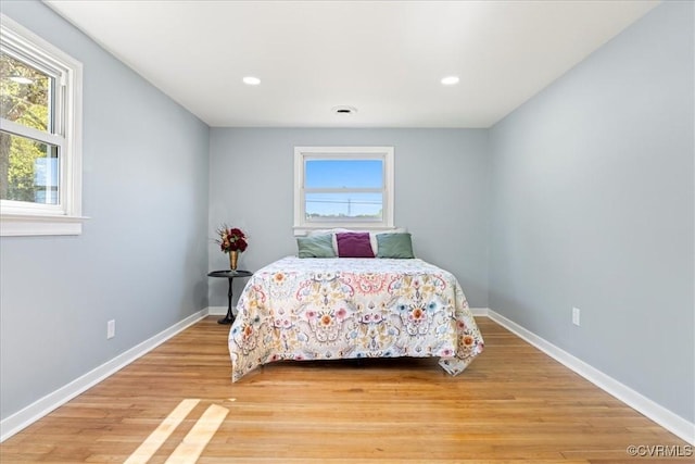 2519 Deerfield Dr, Petersburg, VA 23805 - bedroom featuring multiple windows, baseboards, light wood-type flooring, and recessed lighting
