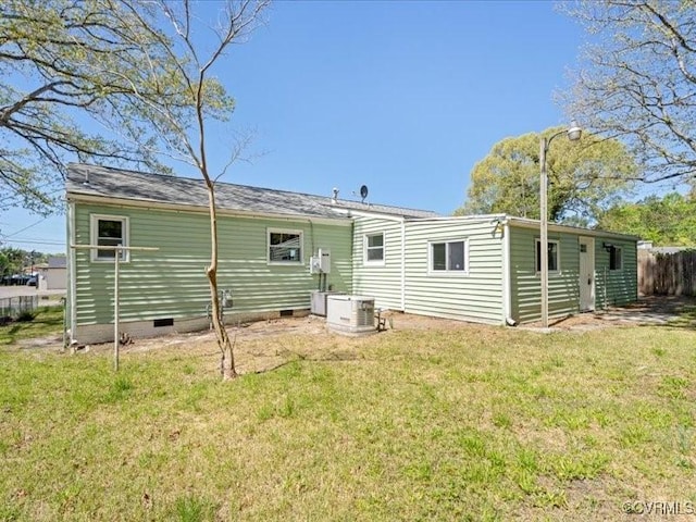 2519 Deerfield Dr, Petersburg, VA 23805 - rear view of property with crawl space and central AC unit