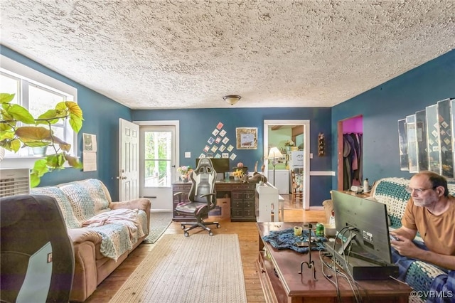 2003 Sweet Hollow Rd, Big Island, VA 24523 - living area featuring wood finished floors and a textured ceiling