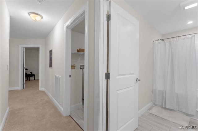5239 Old Buckingham Rd, Powhatan, VA 23139 - hallway featuring baseboards and light carpet