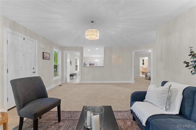 5239 Old Buckingham Rd, Powhatan, VA 23139 - living room featuring a chandelier, carpet floors, and baseboards