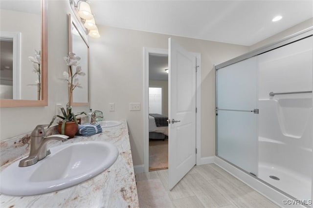 5239 Old Buckingham Rd, Powhatan, VA 23139 - full bath with a shower stall, ensuite bathroom, double vanity, and baseboards