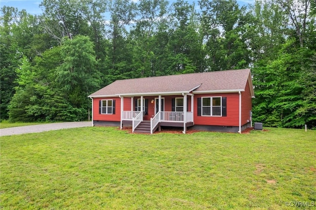 5239 Old Buckingham Rd, Powhatan, VA 23139 - ranch-style home featuring a porch, crawl space, a front yard, central air condition unit, and roof with shingles