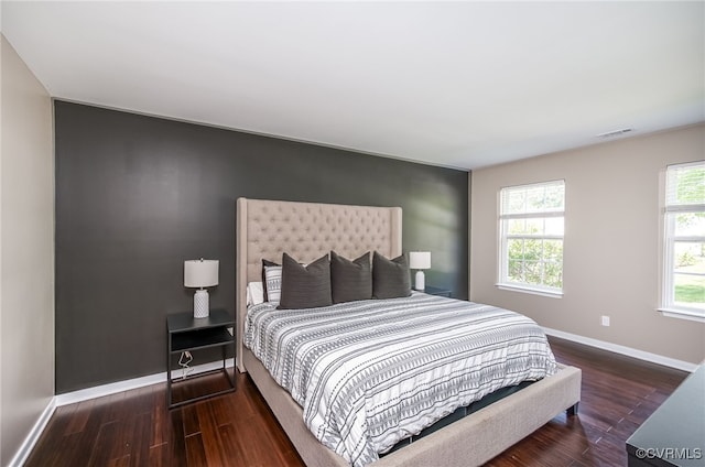 7107 Dortonway Pl, Chesterfield, VA 23832 - bedroom featuring baseboards, wood finished floors, and an accent wall