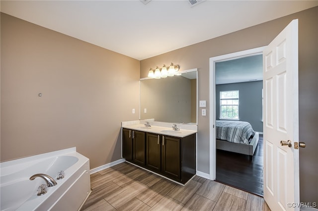 7107 Dortonway Pl, Chesterfield, VA 23832 - ensuite bathroom featuring a bath, baseboards, wood finished floors, and double vanity