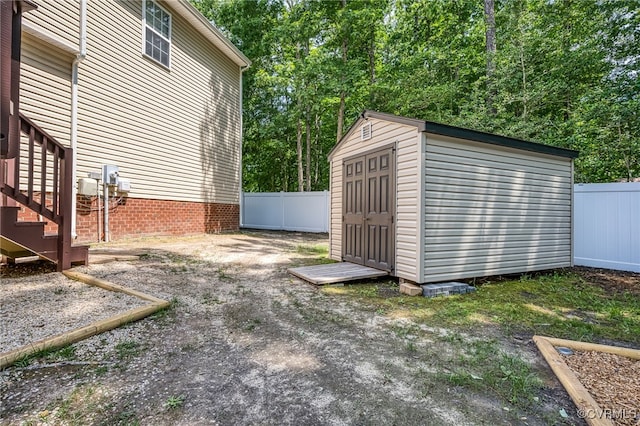 7107 Dortonway Pl, Chesterfield, VA 23832 - view of yard featuring a storage unit, an outbuilding, fence, and stairs