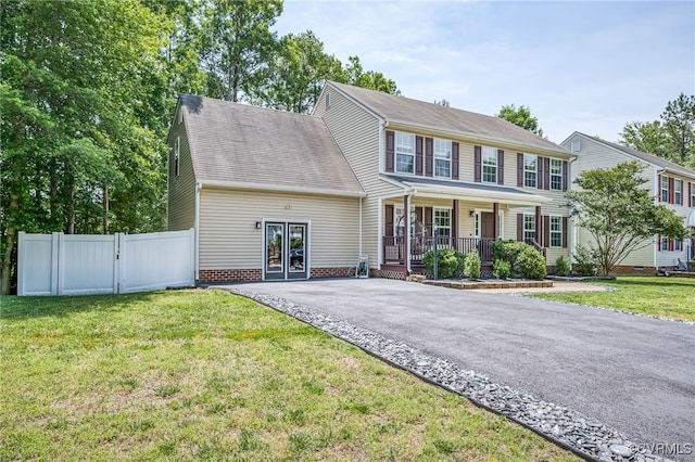 7107 Dortonway Pl, Chesterfield, VA 23832 - colonial inspired home with covered porch, driveway, and a gate
