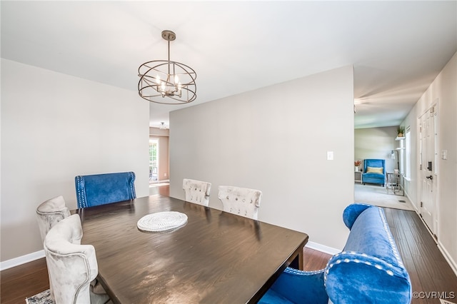 7107 Dortonway Pl, Chesterfield, VA 23832 - dining space featuring a chandelier, wood finished floors, and baseboards