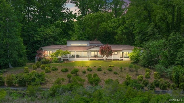 1665 Wilton Creek Rd, Hartfield, VA 23071 - back of property with metal roof