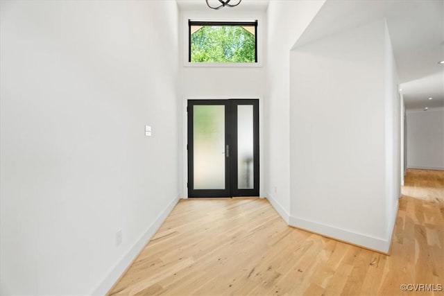 1665 Wilton Creek Rd, Hartfield, VA 23071 - foyer entrance with baseboards and wood finished floors