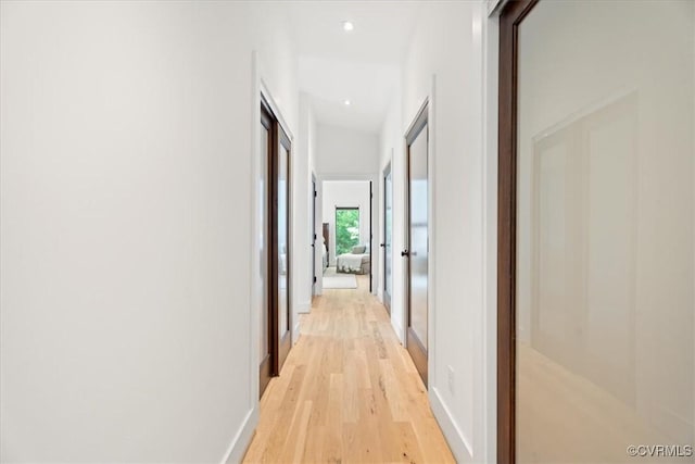 1665 Wilton Creek Rd, Hartfield, VA 23071 - hallway featuring light wood-style flooring, recessed lighting, and baseboards