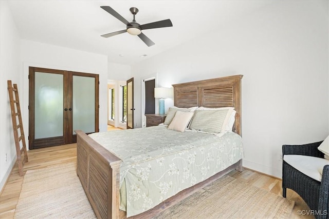 1665 Wilton Creek Rd, Hartfield, VA 23071 - bedroom featuring light wood-style floors, french doors, baseboards, and ceiling fan