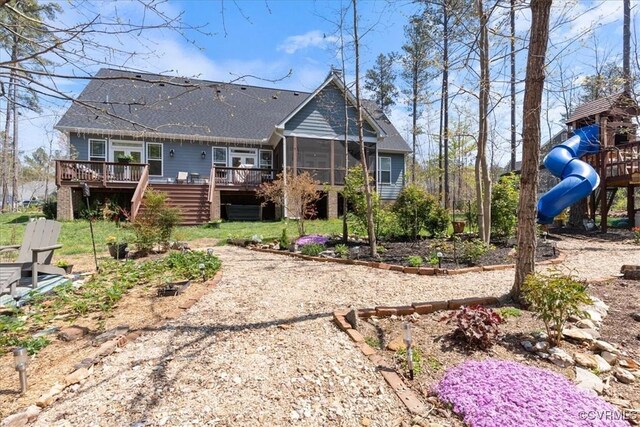41 Pine Shadow Ct, Troy, VA 22974 - rear view of property with a sunroom, a wooden deck, a playground, and roof with shingles