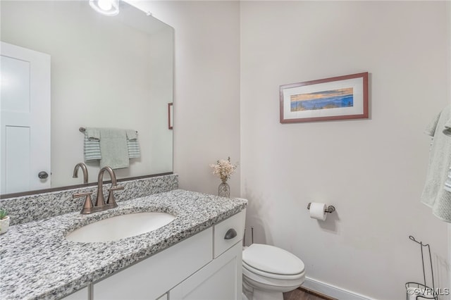 41 Pine Shadow Ct, Troy, VA 22974 - bathroom featuring toilet, vanity, and baseboards