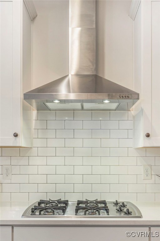 41 Pine Shadow Ct, Troy, VA 22974 - kitchen featuring wall chimney range hood, decorative backsplash, white cabinets, light countertops, and stainless steel gas stovetop