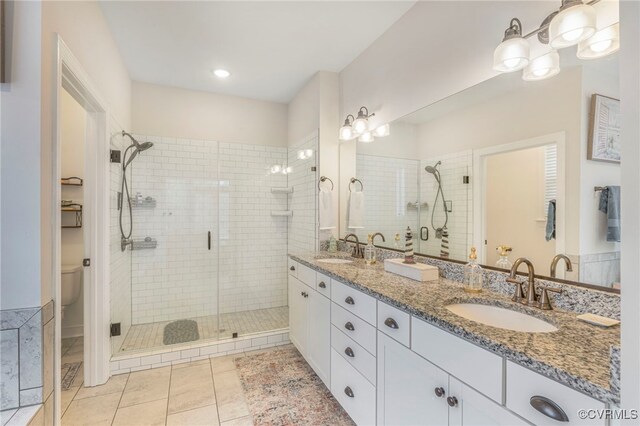 41 Pine Shadow Ct, Troy, VA 22974 - full bathroom featuring a stall shower, tile patterned floors, double vanity, and toilet