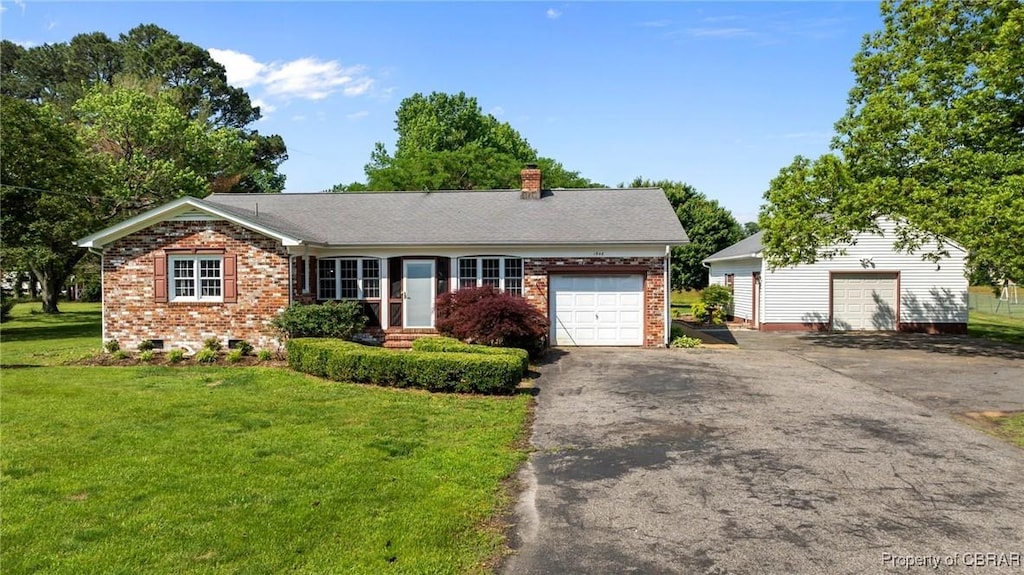 1946 Mark Pine Rd, Hayes, VA 23072 - ranch-style house with a front yard, a chimney, brick siding, and driveway