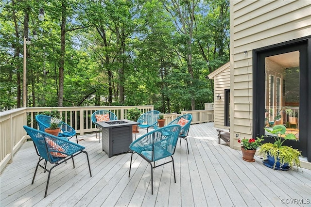 13700 Harbourwood Rd, Midlothian, VA 23112 - deck with a fire pit and view of scattered trees
