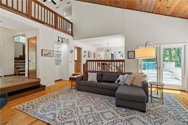 13700 Harbourwood Rd, Midlothian, VA 23112 - living room featuring a chandelier, high vaulted ceiling, stairs, wood finished floors, and a ceiling fan