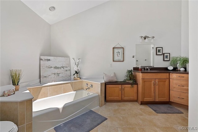 13700 Harbourwood Rd, Midlothian, VA 23112 - bathroom with a garden tub, vanity, toilet, and high vaulted ceiling