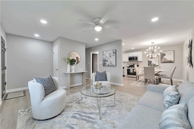 14 Gloucester Cir, Petersburg, VA 23803 - living room featuring light wood-type flooring, ceiling fan, baseboards, and recessed lighting