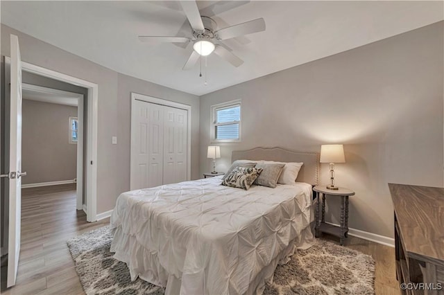14 Gloucester Cir, Petersburg, VA 23803 - bedroom with baseboards, a closet, light wood-style floors, and ceiling fan