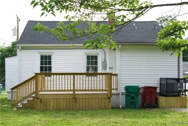 25 N Foley St, Petersburg, VA 23803 - rear view of property with a deck, roof with shingles, a chimney, a yard, and central air condition unit