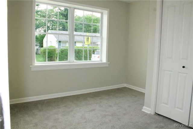 25 N Foley St, Petersburg, VA 23803 - empty room with carpet flooring and baseboards