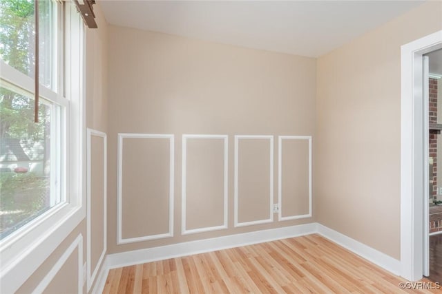 6006 Meadwood Cir, North Chesterfield, VA 23234 - empty room featuring healthy amount of natural light, light wood-style floors, and baseboards