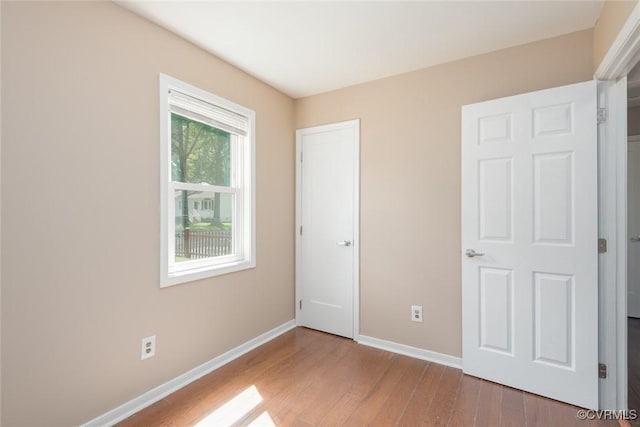 6006 Meadwood Cir, North Chesterfield, VA 23234 - unfurnished bedroom with wood finished floors and baseboards
