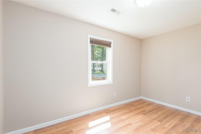 6006 Meadwood Cir, North Chesterfield, VA 23234 - spare room featuring light wood-type flooring and baseboards