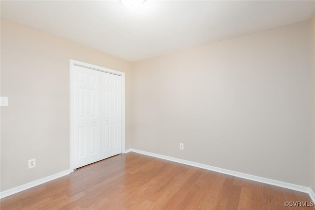 6006 Meadwood Cir, North Chesterfield, VA 23234 - unfurnished bedroom with light wood-style flooring and a closet