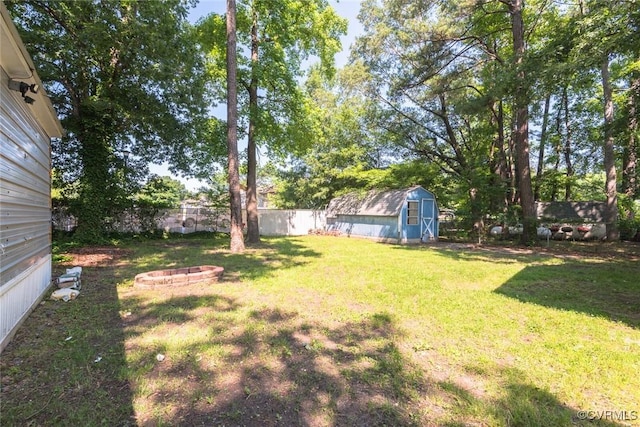 6006 Meadwood Cir, North Chesterfield, VA 23234 - fenced backyard with a fire pit and a shed
