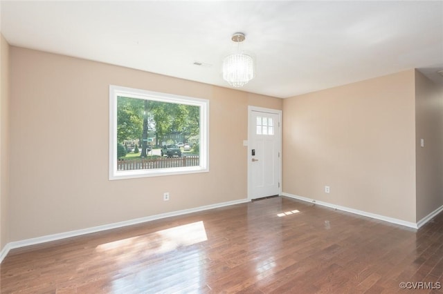 6006 Meadwood Cir, North Chesterfield, VA 23234 - foyer entrance with a chandelier, baseboards, and wood finished floors