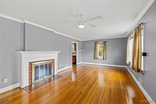 2405 Dumbarton Rd, Henrico, VA 23228 - unfurnished living room featuring ceiling fan, wood-type flooring, baseboards, ornamental molding, and a brick fireplace