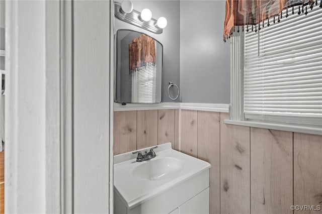 2405 Dumbarton Rd, Henrico, VA 23228 - bathroom with vanity, wooden walls, and a wainscoted wall