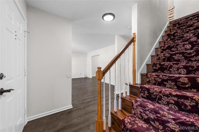 15119 Winding Ash Dr, Chesterfield, VA 23832 - stairs featuring wood finished floors and baseboards