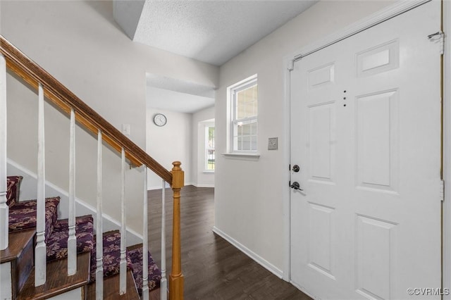 15119 Winding Ash Dr, Chesterfield, VA 23832 - entryway featuring dark wood-style floors, baseboards, stairway, and a textured ceiling