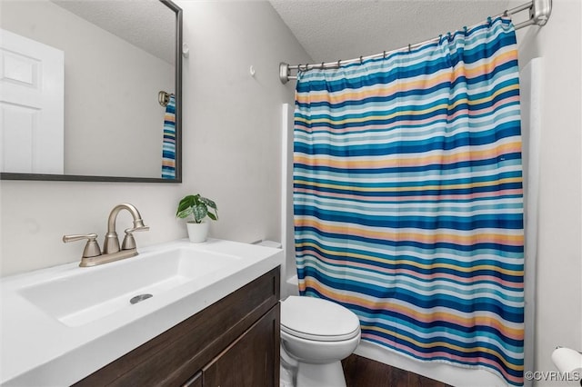 15119 Winding Ash Dr, Chesterfield, VA 23832 - full bathroom featuring a textured ceiling, toilet, a shower with curtain, vanity, and wood finished floors
