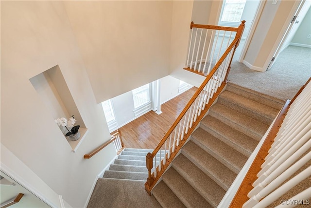 521 Siena Ln, Henrico, VA 23059 - staircase with plenty of natural light and carpet floors